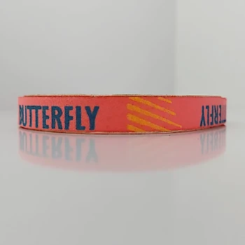 نوار دور راکت ضربه گیر فومی باترفلای رنگ گلبهی خط دار زرد